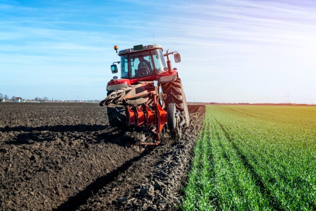 tractor agricultural machine cultivating field 1